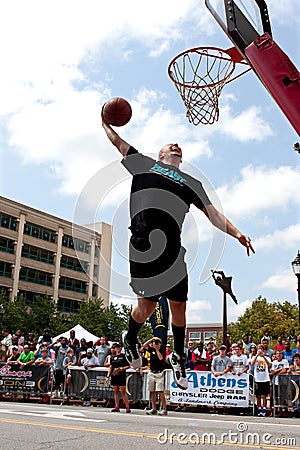 Man Leaps To Jam Basketball In Outdoor Slam Dunk Contest