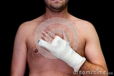 Man with little finger in cast