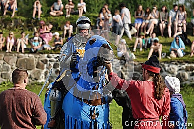 Man in a medieval historical clothes on horseback