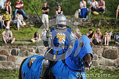 Man in a medieval historical clothes on horseback