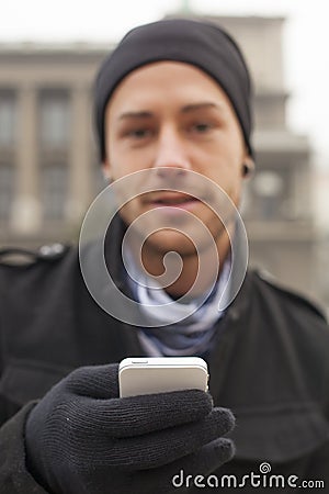 Man with mobile phone in hands