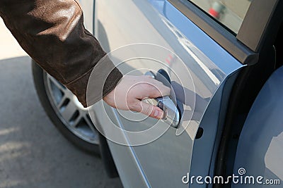 Man is open the door of car