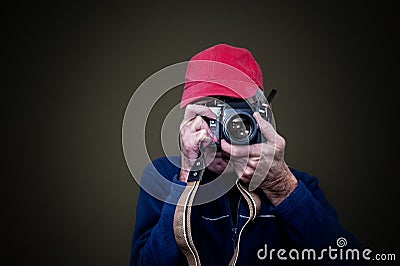 Man photographing with his vintage film camera