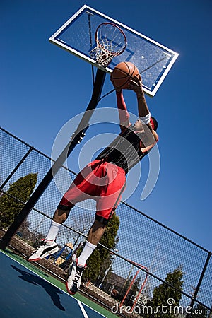 Man Playing Basketball