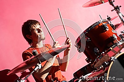 Man playing on drum