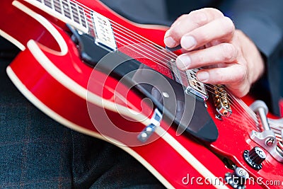 Man playing an electric guitar