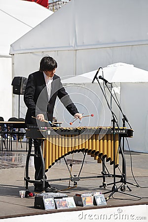 Man plays xylophone at festival White Nights