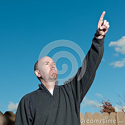 Man Pointing to the Sky