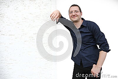Man posing on the wall