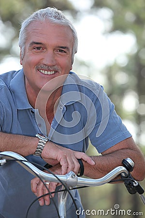 Man with push bike