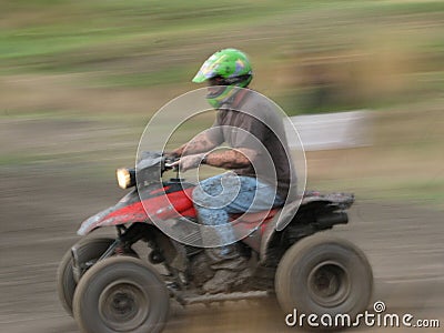 Man on a Quad Bike racing