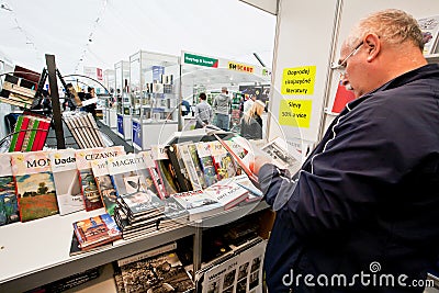Man read a book on International Book Fair