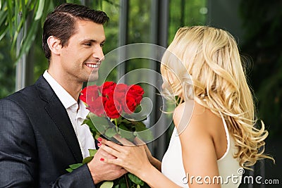 Man with roses dating his lady