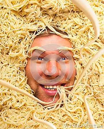 Man s face in pasta, closeup