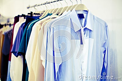 Man shirts with tag on hangers