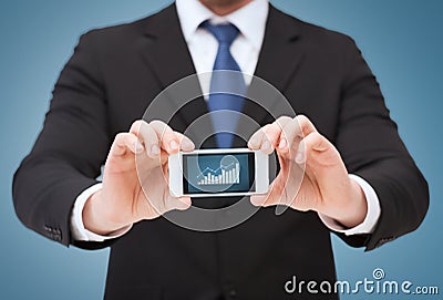 Man showing smartphone with graph on screen