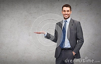 Man showing something on the palm of his hand