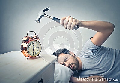 Man sleeping and using a hammer