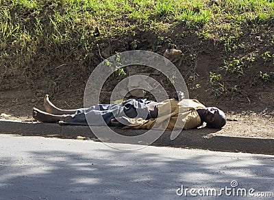 Homeless Man Sleeps on the Street