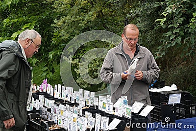 Man with stall selling plant seeds