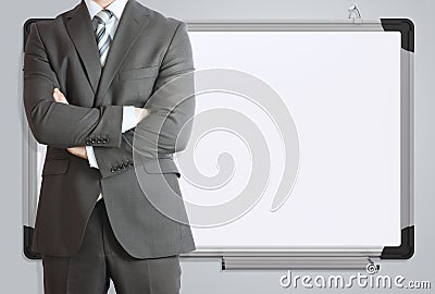 Man in suit and office board