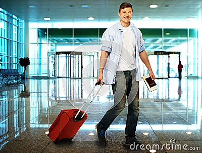 Man with suitcase in airport