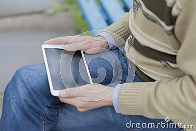 Man with tablet in hand