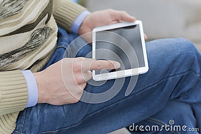 Man with tablet in hand