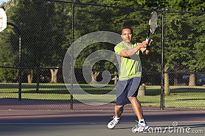 Man on Tennis Court Playing Tennis