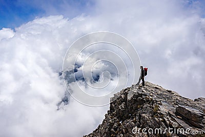 Man on top of mountain