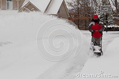 Man Using a Snow Blower