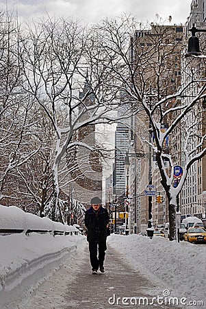 A man walks in the snow, New York City