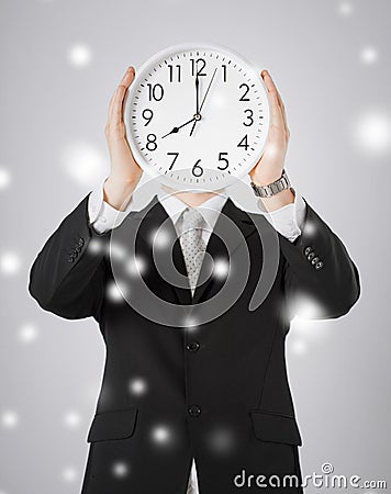 Man with wall clock