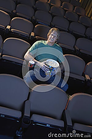 Man Watching Movie In Theater