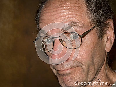 Man wearing glasses with broken lens