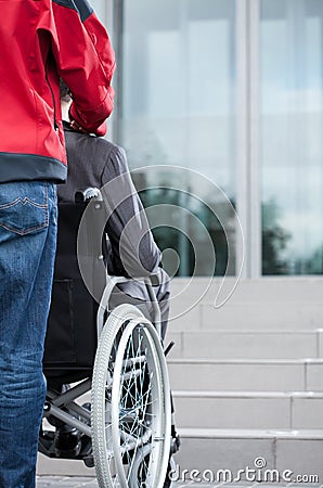 Man on wheelchair before work