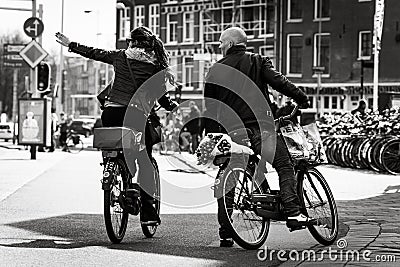 Man and woman on the bikes, Amsterdam