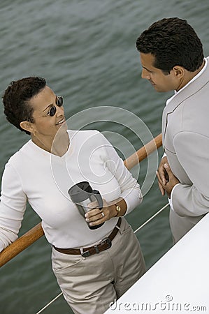 Man And Woman Conversing On The Yacht