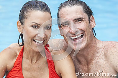 Man & Woman Couple Relaxing In Swimming Pool