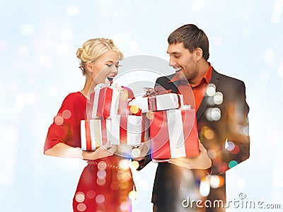 Man and woman with gift boxes