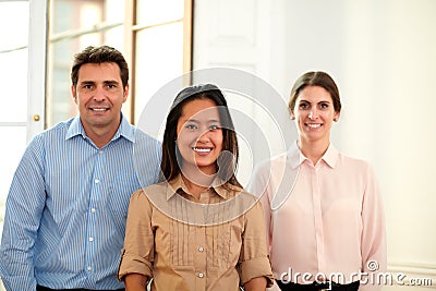 Man and woman group smiling at you