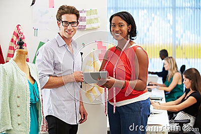 Man And Woman Meeting In Fashion Design Studio