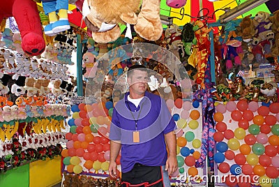 Man working at Fair or Carnival