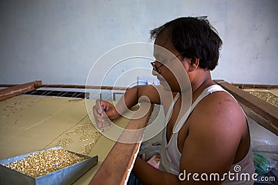 Man working in a fair-trade workshop in Agra