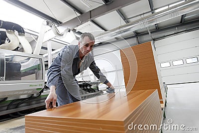 Man working in furniture factory