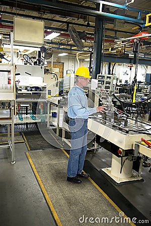 Man Working in Industrial Manufacturing Factory