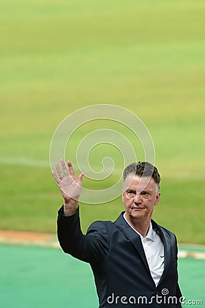 Manchester united boss louis van gaal waving hand