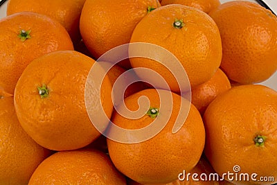 Mandarin oranges close up looking down