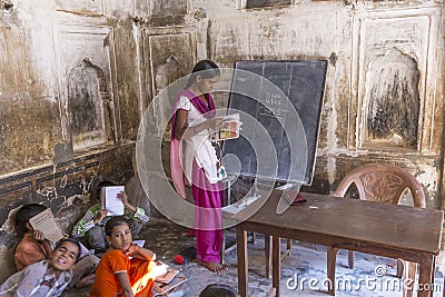 Children and teacher in a village school in Mandawa, India