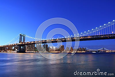 Manhattan Bridge and Manhattan skyline At Night